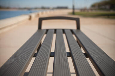 Cordia Bench shown in 6 foot, backless configuration with aluminum slats